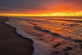 Scenic shot of the ocean waves and coast at sunset, Hamptons, US