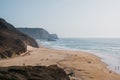 Scenic shot of the Praia do Cordoama beach in Algarve Portugal with cliffs and a sandy coastline Royalty Free Stock Photo