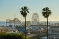 Scenic shot of rollercoaster ride and ferris wheel at end of Santa Monica Pier