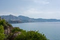 Scenic shot of the sea and mountains from the Balcon de Europa in Nerja, Spain Royalty Free Stock Photo