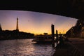 Scenic shot of a ship of the river in the evening with the Eifel tower on the background
