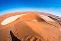 The scenic Sossusvlei and Deadvlei, clay and salt pan surrounded by majestic sand dunes. Namib Naukluft National Park, travel dest Royalty Free Stock Photo