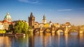 Scenic spring sunset aerial view of the Old Town pier architecture and Charles Bridge over Vltava river in Prague, Czech Republic Royalty Free Stock Photo