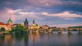 Scenic spring sunset aerial view of the Old Town pier architecture and Charles Bridge over Vltava river in Prague, Czech Republic Royalty Free Stock Photo