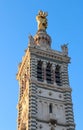 The scenic stone bell tower of Notre Dame de la Garde Basilica, Marseille, France. Royalty Free Stock Photo