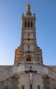 The scenic stone bell tower of Notre Dame de la Garde Basilica, Marseille, France. Royalty Free Stock Photo