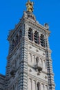 The scenic stone bell tower of Notre Dame de la Garde Basilica, Marseille, France. Royalty Free Stock Photo