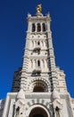 The scenic stone bell tower of Notre Dame de la Garde Basilica, Marseille, France. Royalty Free Stock Photo