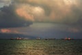 Scenic stormy dramatic sunset over the Black Sea, panorama with Royalty Free Stock Photo