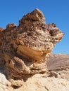 Scenic stratified orange rock in stone desert, Isr