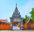 The ornate gate of Wat Pratu Pong, Lampang, Thailand