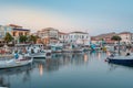 Myrina, Lemnos island, Greece the magical touristic Greek islands at sunset. Port of Limnos panoramic view at dusk. Long exposure Royalty Free Stock Photo