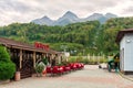 Scenic summer landscape of Aibga peaks viewed from Krasnaya Polyana mountain resort with BigFood cafe on foreground, Caucasus