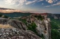 Scenic summer landscape shot in Greece with beautiful cliffs and epic monastery on it