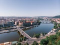 Scenic summer sunrise aerial view of the Old Town pier architecture and Charles Bridge over Vltava river in Prague, Czech Republic Royalty Free Stock Photo