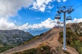 Scenic sunny blue sky landscape of Caucasus mountains with cableway ski lift of Gorky Gorod mountain resort in Sochi