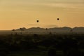 Scenic sunrise with many hot air balloons above Bagan in Myanmar Royalty Free Stock Photo