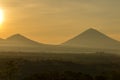 Scenic sunrise and mist at Batur and Agung volcano, Kintamani, Bali, Indonesia. Sunrise view of Batur volcano, nature landscape Royalty Free Stock Photo