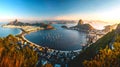 Panoramic view of a scenic cityscape at sunrise with mountains and sea. Vibrant colors and traveling concept Royalty Free Stock Photo