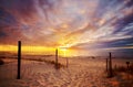 Scenic sunset over Baltic Sea beach with dramatic cloudscape Royalty Free Stock Photo