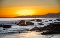 Scenic sunset over the rocky beach and serene ocean. Martha's Vineyard, Massachusetts Royalty Free Stock Photo