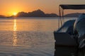 Scenic sunset on Philippines, Asia, with white boat foreground. Bright sunset with isles and boat silhouettes on background. Royalty Free Stock Photo