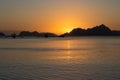 Scenic sunset on Philippines with traditional boats silhouettes. Bright sunset with isles on background. Evening dusk on coastline Royalty Free Stock Photo