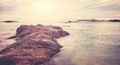 Scenic sunset on a rocky beach, color toning applied, Sri Lanka Royalty Free Stock Photo