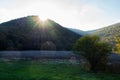 Scenic sunset in summer forest with sun rays in Caucasus Mountains by Anapa, Sukhoy Liman