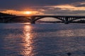 Scenic sunset view on a metro bridge and Dneper River from Hydropark in Kyiv, Ukraine