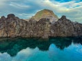 Porto Moniz - Panoramic view of natural lava swimming pools Piscinas Naturais Velhas in coastal town Porto Moniz, Madeira island