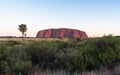 Scenic sunset view on red Uluru in NT central outback Australia