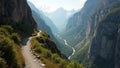 Scenic trail through mountain pass with sheer cliffs Royalty Free Stock Photo
