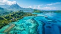 Scenic tropical island with lush green mountains, crystal clear blue waters, and overwater bungalows in a tranquil setting Royalty Free Stock Photo