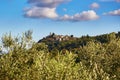 Scenic Tuscan landscape with small village on top of hill Royalty Free Stock Photo