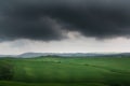 Scenic Tuscany landscape panorama with rolling hills and harvest fields in golden morning light Royalty Free Stock Photo