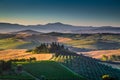 Scenic Tuscany landscape with rolling hills and valleys at sunrise