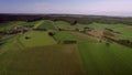 Valley landscape, campsites and forests, rolling hills and farmlands. Aerial