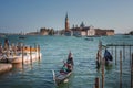 Scenic Venice Gondolas. Traditional Boats on Canal with Buildings and Bridges in Italy