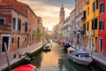 Scenic Venice view at sunset. Venice canal in downtown. Venezia cityscape, Italy