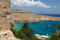 Scenic view from the acropolis on a bay with blue and turquoise water in Lindos on Rhodes island, Greece Royalty Free Stock Photo