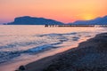 Scenic view from Alanya beach at the sunset, Turkey. At the background Alanya Peninsula Royalty Free Stock Photo