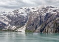 Scenic view of Alaskan College Fjord with snow-capped peaks, pristine waters, and glaciers