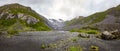 Scenic view of Alaskan landscape early fall mountains in the back Royalty Free Stock Photo