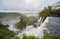 Scenic view along the crashing edge of the Iguazzu waterfalls from the argentinian side. Royalty Free Stock Photo