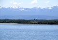 Comox airport tower and the Strathcona Mountain range in the background, Vancouver Island Royalty Free Stock Photo