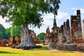 Scenic View Ancient Buddhist Temple Ruins and Buddha Statue of Wat Mahathat in The Sukhothai Historical Park, Thailand Royalty Free Stock Photo