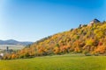 Scenic view of ancient ruins of gothic and renaissance medieval royal castle, autumn landscape, sunny day, fortresses on hill,