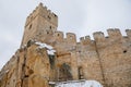 Scenic view of ancient ruins of old gothic medieval castle Helfenburk u Usteka with stone tower under snow in winter day,