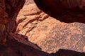 Scenic view of arch rock formation seen from the staircase of Atlatl rock in Valley of Fire State Park in Mojave desert Royalty Free Stock Photo